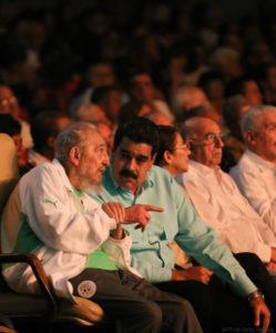In this handout picture released by Prensa Miraflores, former Cuban President Fidel Castro (L), sitting next to Venezuelan President Nicolas Maduro, is seen attending the celebration of his 90th birthday at the Karl Marx theatre in Havana on August 13, 2016. / AFP / Prensa Miraflores / XGTY/RESTRICTED TO EDITORIAL USE-MANDATORY CREDIT "AFP PHOTO/PRENSA MIRAFLORES" NO MARKETING NO ADVERTISING CAMPAIGNS-DISTRIBUTED AS A SERVICE TO CLIENTS-GETTY OUT (Photo credit should read /AFP/Getty Images)