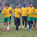 jsk canaris entrainement pluie jaune et vert