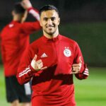 adam ounas rouge a doha sourire